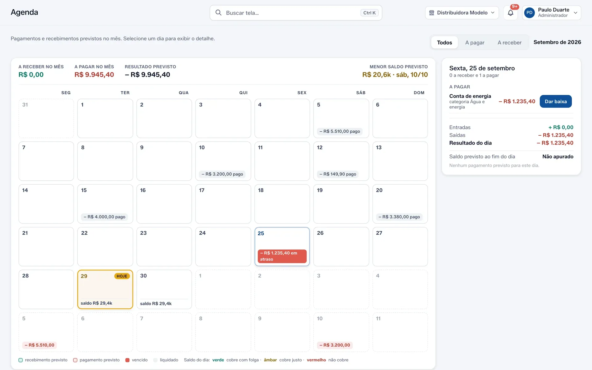 A Agenda, com o calendário do mês, os saldos coloridos e o painel do dia aberto.